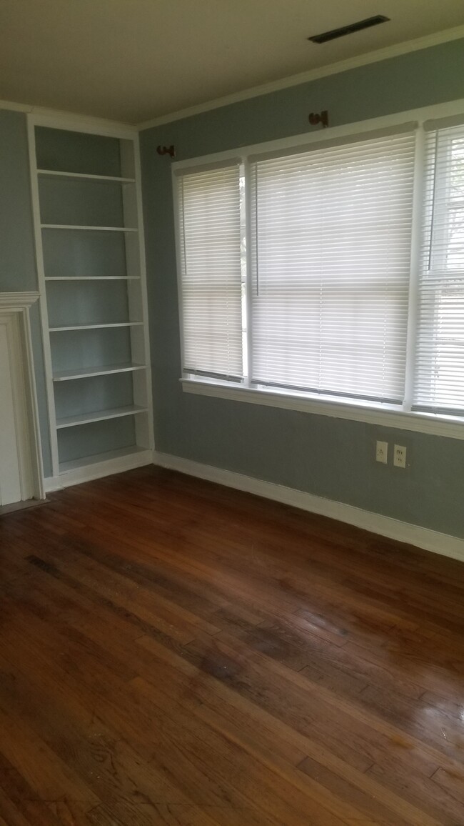 Bookshelves in living area - 644 Choctaw Rd