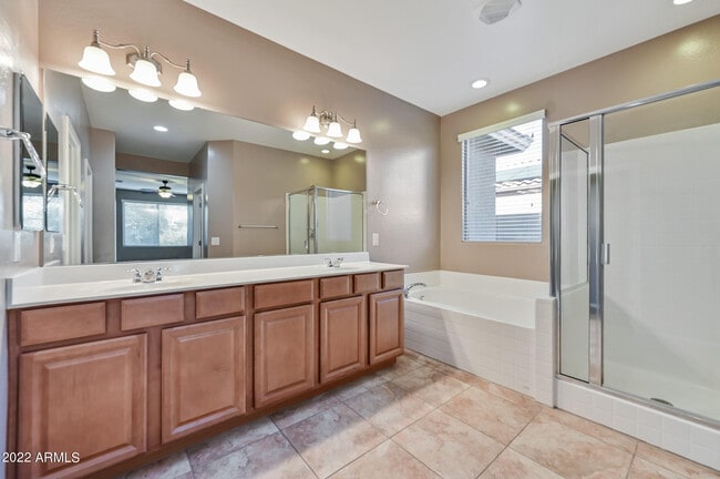 Building Photo - 8767 W Fleetwood Ln