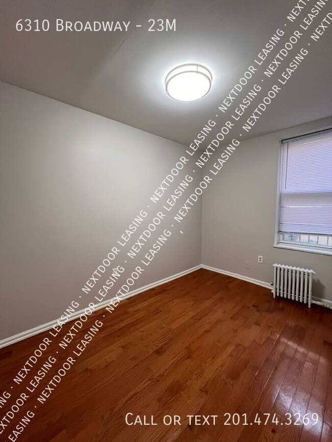 Building Photo - 6310 Broadway-23M