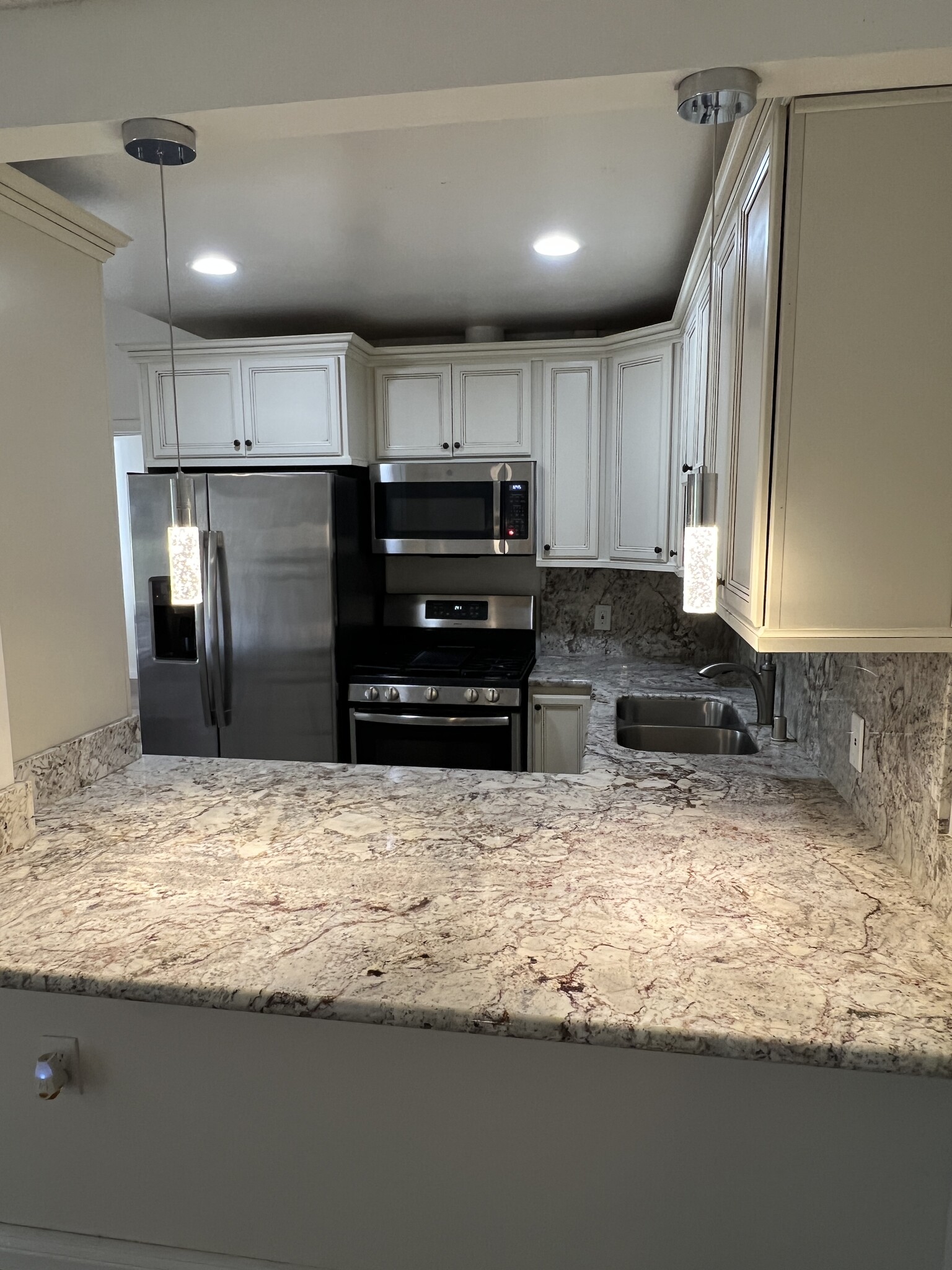 Stainless Refrigerator & Stove - 19156 Avenue of the Oaks