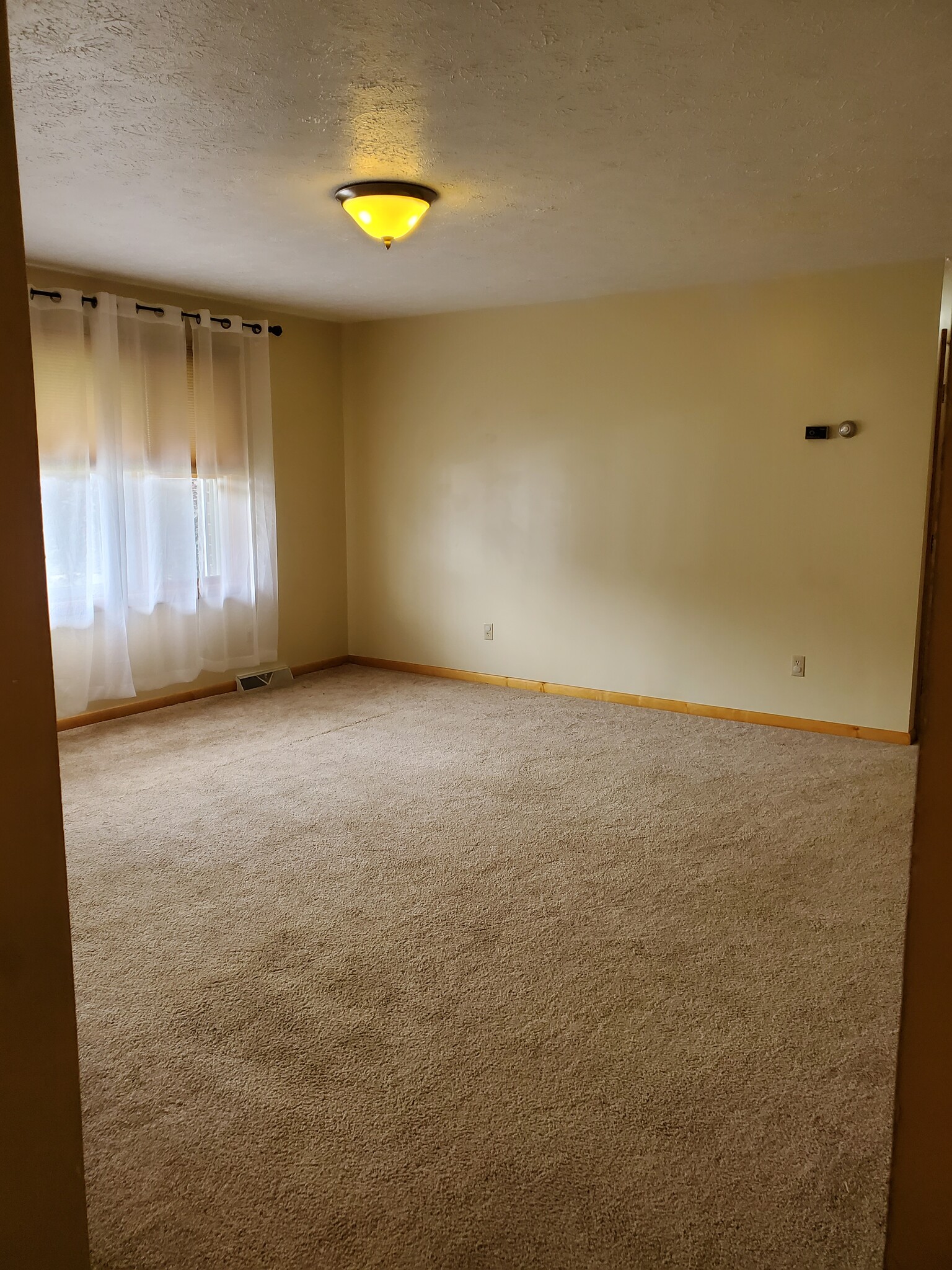 Living room from kitchen - 1143 W Gore Rd