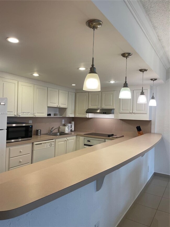 Building Photo - 19390 Collins Ave