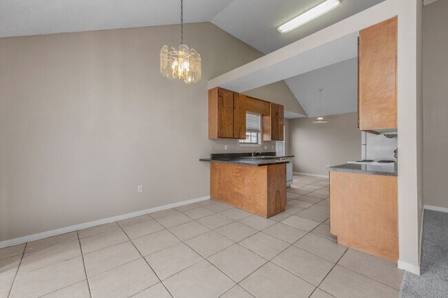 Building Photo - Charming 3BR/2BA with Fenced Yard & Commun...