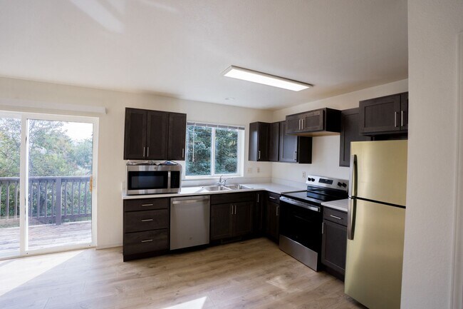 Building Photo - FULLY GUTTED & RENOVATED 4-Bedroom Condo Near Montana State University