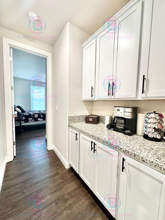 Building Photo - Welcome to your dream home, where modern elegance meets unparalleled convenience!