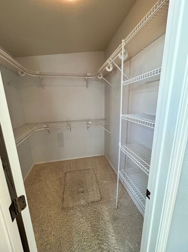 Building Photo - Spacious Duplex with 3-Car Garage & Private Patio!