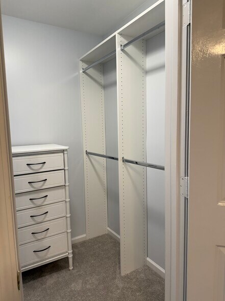 New custom closets with single and double hang rods (dresser stays) - 226 Hillsboro Pl
