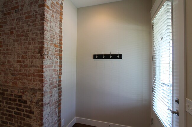 Building Photo - Midtown Renovated Duplex - Hardwood Floors, Exposed Brick