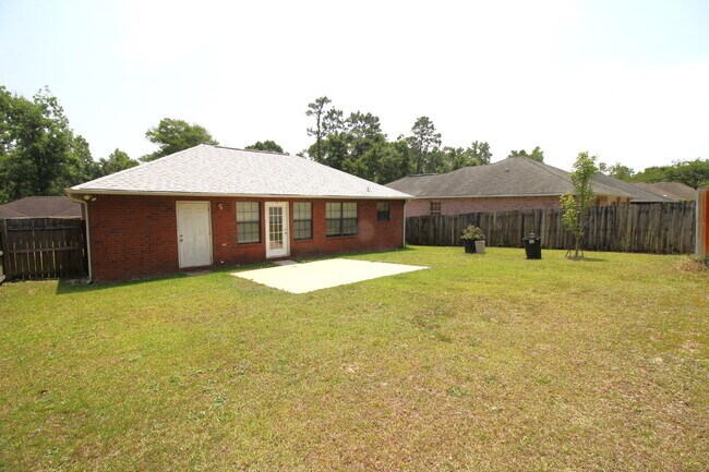 Building Photo - 3BR/2BA North Pensacola Brick Home with Bonus Room, Vaulted Ceilings & Privacy-Fenced Backyard Ne...