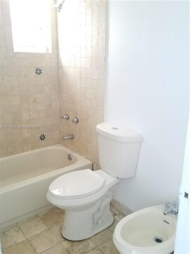 Building Photo - 2457 Collins Ave