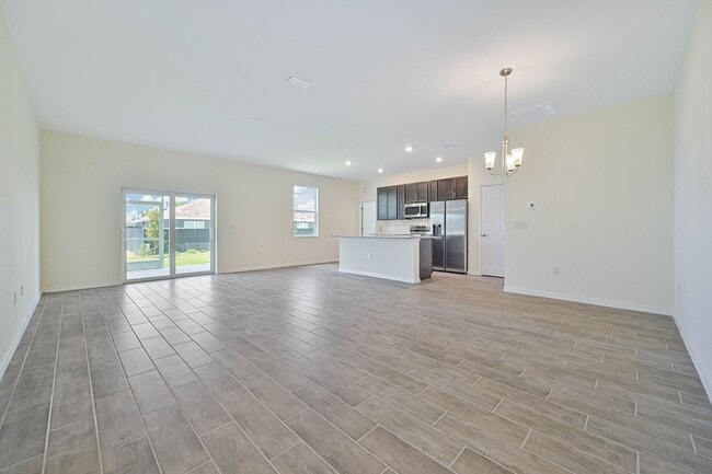 Building Photo - ** 3 + Den Home in NW Cape ~ 2 Car Garage **