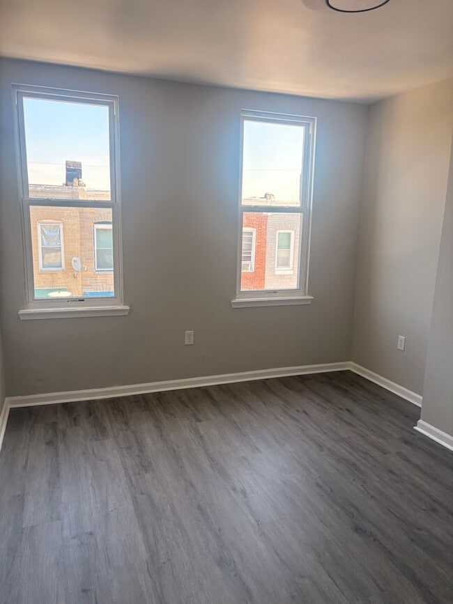 Building Photo - Charming Baltimore Rowhome Near Johns Hopkins – Bright & Move-In Ready