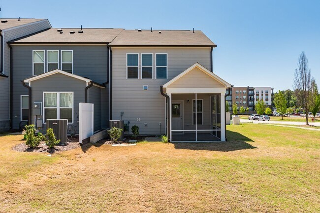 Building Photo - End unit townhome loaded with upgrades close to RTP! Available: Now