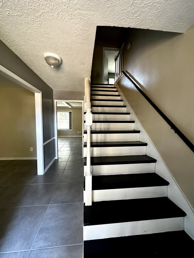 Front door hallway and stairs view - 15231 Highsprings Dr