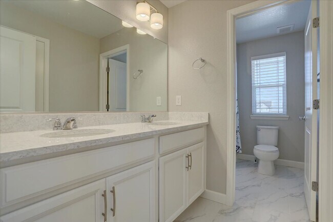 Building Photo - 5-Bed/4-Bath built in 2022!