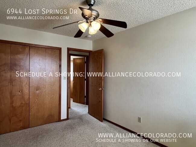 Building Photo - 6944 Lost Springs Dr