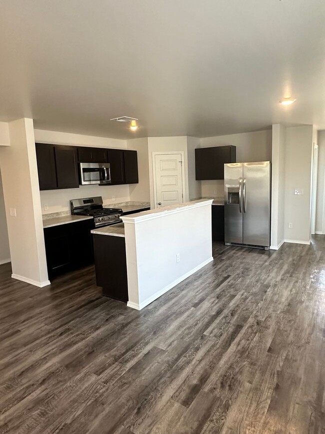 Building Photo - *Preleasing* NEW Three Bedroom | Two Bath ...