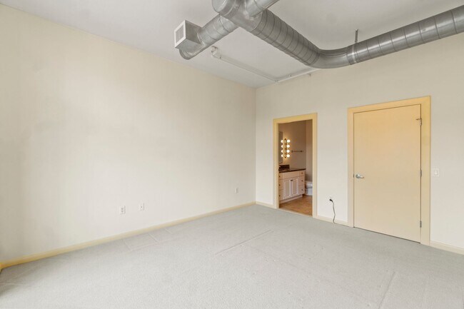 Building Photo - Madrigal Lofts in Mt Vernon Triangle | 2 Bed | 2 Bath | 920 Sf | Balcony | 1 Garage Parking Space