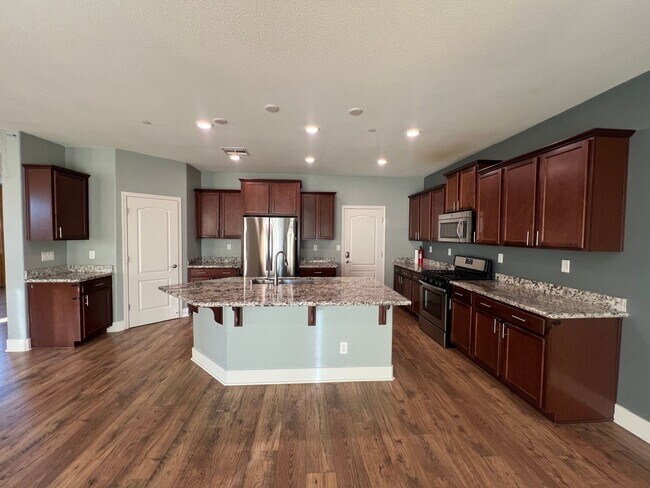 Building Photo - Updgraded Blackstone Community Three Bedro...