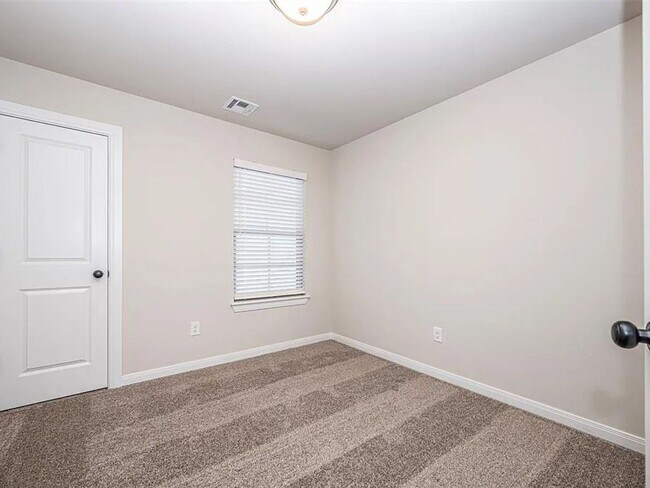 Building Photo - 4-Bed Home with Storm Shelter & 2-Car Garage in Mustang