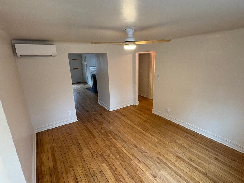 Dining room with refinished hardwood floors - 6035 Oakwood Ave