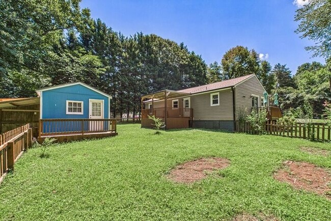 Building Photo - Charming Ranch Home with Bonus Studio & Ou...