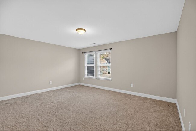 Building Photo - Move-In Ready Gem with Main-Level Owner's Suite