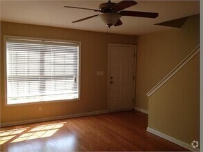 Building Photo - Great 2 bedroom townhome community located...