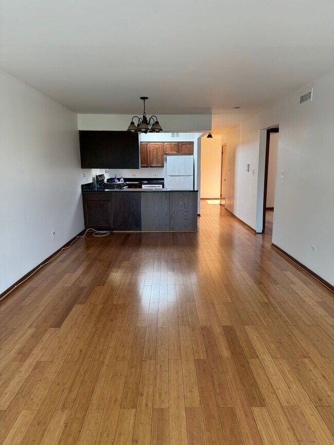 Building Photo - Spacious 2BR Townhome in West Ridge – 1,80...