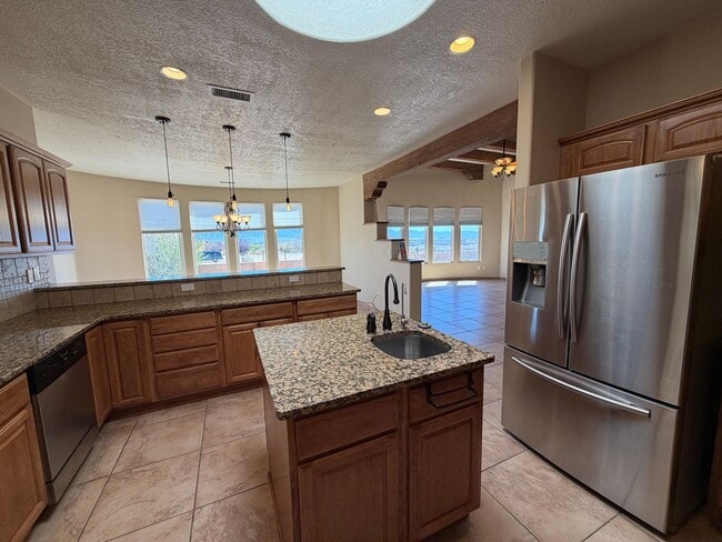 Building Photo - 4 Bedroom Single Story Custom Home Available In Rio Rancho Near Unser Blvd SE & Westside Blvd SE!