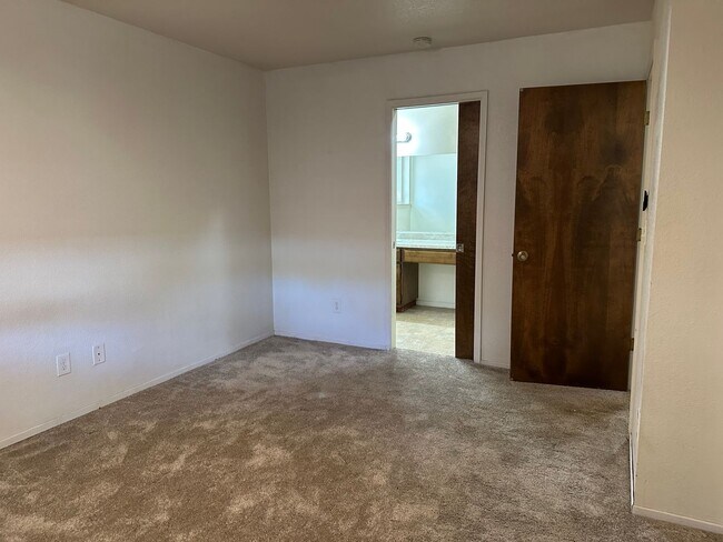 Building Photo - Charming Redding Home with Fireplace & Vau...