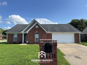 Building Photo - Stunning 3BR/2BA Olive Branch Home | 1,484 Sq Ft, Vaulted Primary, Sunlit Dining & Garage
