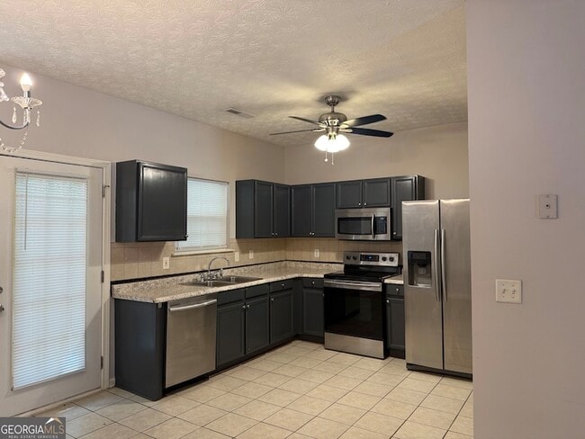 Building Photo - 1704 Camden Forrest Tr