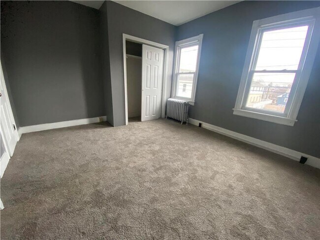 Building Photo - Charming three-bedroom row house available...