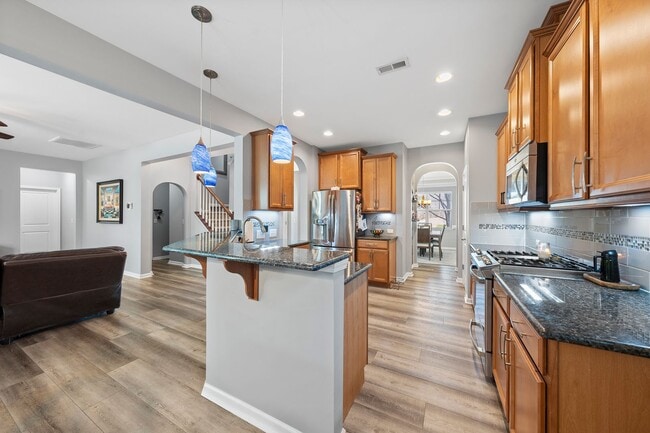 Building Photo - Stunning Apex Home with First-Floor Privat...