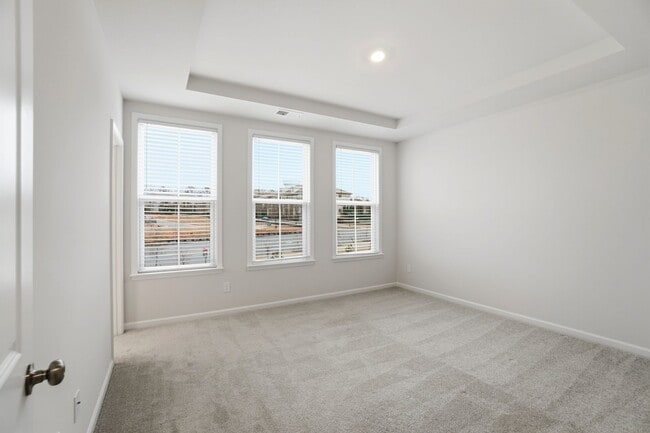 Building Photo - Brand-new three-story townhome in the University area at Senata at Research Park!