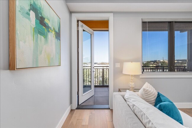 Building Photo - COME HOME TO REFINED DOWNTOWN LUXURY CONDO...
