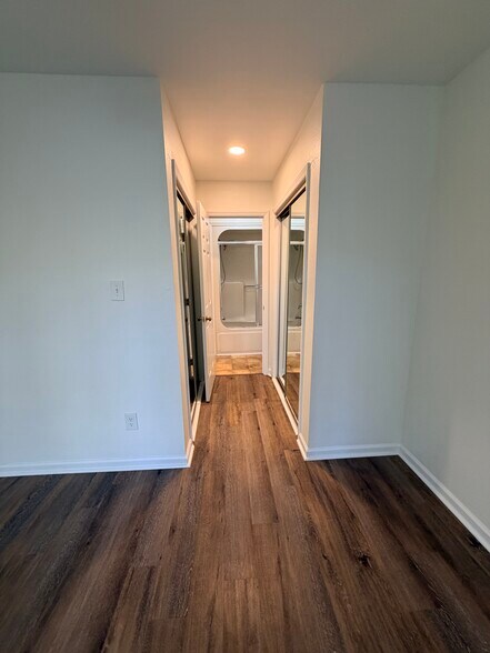 His and Her Closets, entry to bathroom - 109 Killam Ct