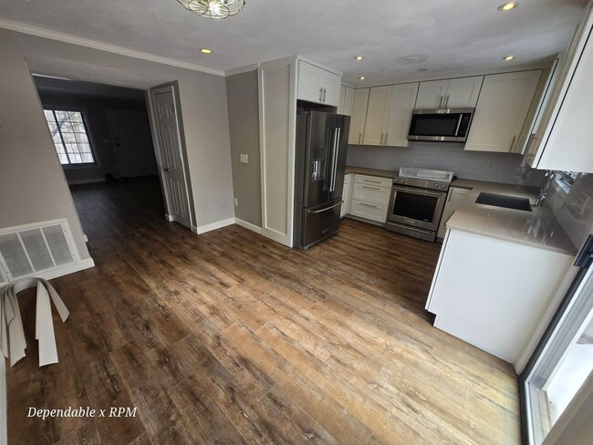 Building Photo - Stunning 2 Bd 2 Bath Townhouse in Wakefield w 2 parking spaces and 3 Levels of Living