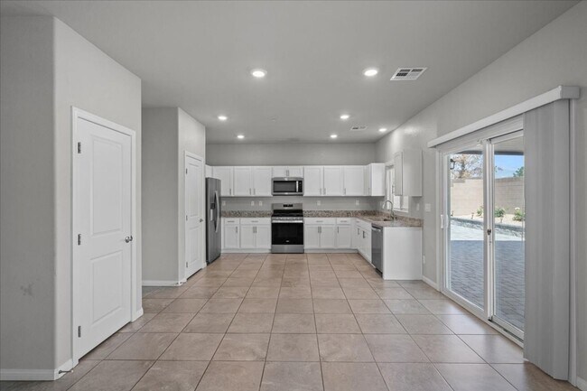 Building Photo - This beautiful new home is a real gem, eig...