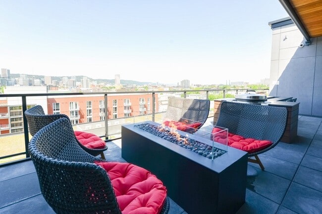 Rooftop terrace with cozy firepit and unobscured downtown Portland views - Windsor Buckman