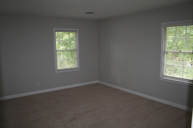 Building Photo - Live at the Center of Modern Conveniences ...
