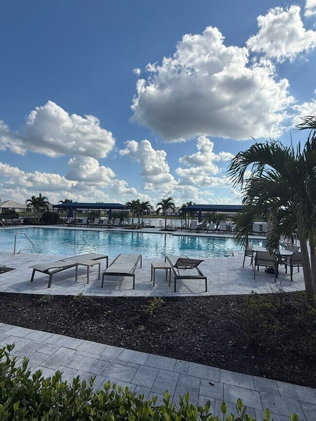 Building Photo - 2BR 2BA Home w/ Quartz Island Kitchen + Pond View Lanai + 2-Car Garage in Lakewood Ranch