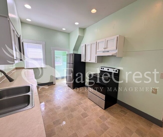 Building Photo - Charming Historic 4-Bedroom Home with Fenced Yard & Chicken Coop