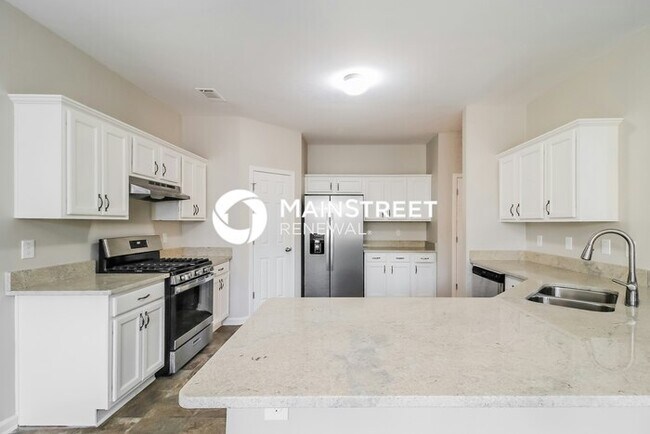 Building Photo - 6 Bedroom Pet-Friendly Home in Buford, GA with Main Street Renewal