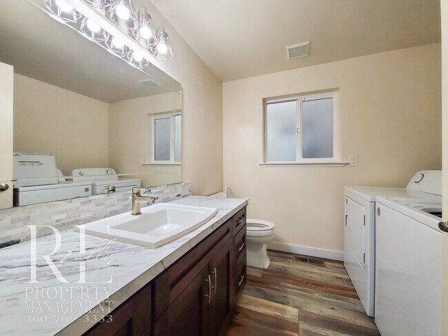 Building Photo - Modernized Two-Story with Open Layout, Gas Fireplace & Large Fenced Yard