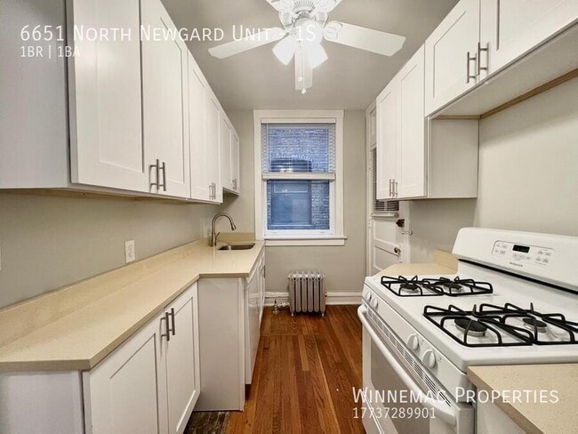 Building Photo - 6651 N Newgard Ave