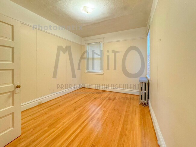 Building Photo - 602 E 23rd Ave