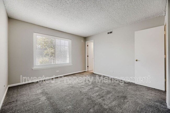 Building Photo - 9330 E Girard Ave