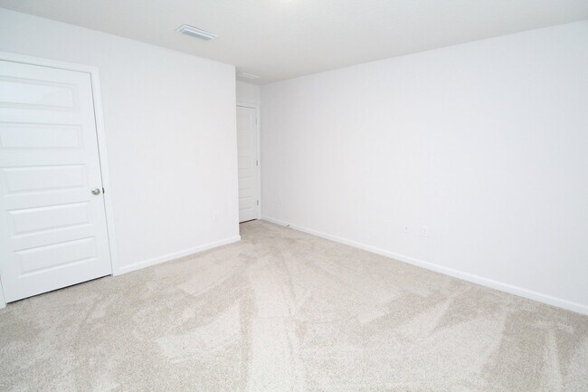 Building Photo - Lakeshore Preserve 3BR Home with Garage – ...